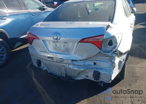 2017 Toyota Corolla Le z USA, uszkodzony, nr VIN 5YFBURHE5HP623195